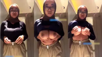 Remasan Payudara Hijaber Toge Yang Menggoda